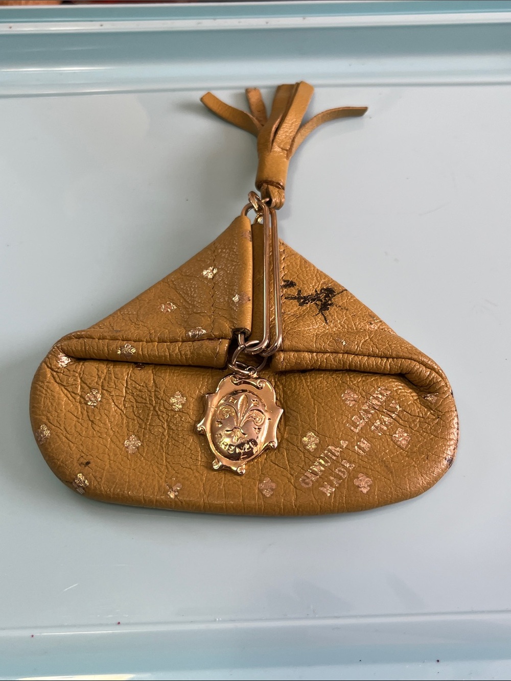 Metallic Gold Mini Coin Pouch with Tassel and Crest Charm